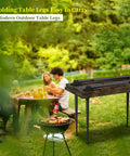 3 In 1 Metal Folding Table Legs With Adjustable Floor Protectors For Round Or Square Tables next to an outdoor picnic