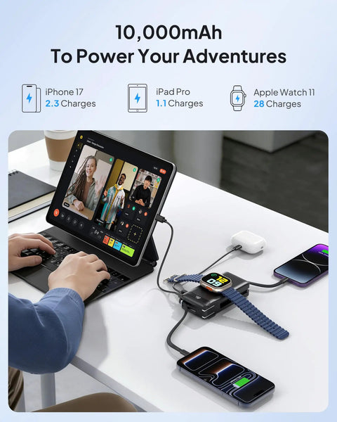 Ultimate 10000mAh Power Bank With 22.5W Fast Charging And Built In Lightning Usb C Cables Plus Foldable Wall Plug For iPhone And Apple Watch Squad Ready Gear charging devices on a desk.