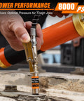 THINKWORK 8000 PSI grease gun with pistol grip loading a 14 oz cartridge, orange-labeled cartridge visible