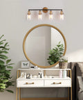 Modern Black And Gold Vanity Lights Over Mirror, Four Light Bathroom Fixture With Clear Glass Shades, 30 Inch Long Bath Vanity Bar