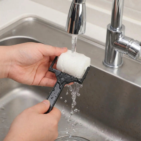 Person rinsing a foam roller from the 6 Piece Foam Sponge Roller And Brush Set Hella Smooth Kids Painting Tools.