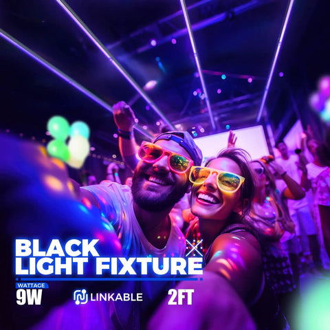 Party scene lit by UV LED Blacklight Bar 9W 2Ft T5 Integrated Fixture, glasses glowing under black light, crowd dancing.