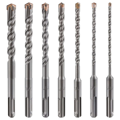 Seven carbide-tipped concrete drill bits with copper tips, twisted flutes and hex shanks.