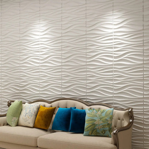 Living room with sofa and Wavy White PVC Wall Panels Pack Of 12, 19.7x19.7 inches, lightweight and fire resistant backdrop.