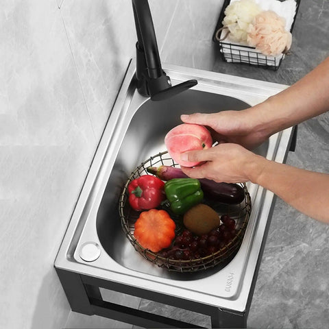 Wall Mounted Outdoor Kitchen Faucet with Filter Durable and Wear Resistant Professional Grade Perfect for Outdoor Cooking and Gardening Easy Installation in a stainless steel sink with fresh produce.