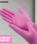SafeSkin ultralight nitrile gloves, magenta, large, pair worn on hands