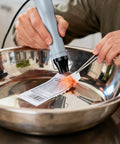 Using Mini Heat Gun With Dual Temperature Control 482F And 662F for crafting in metal bowl for precise artwork