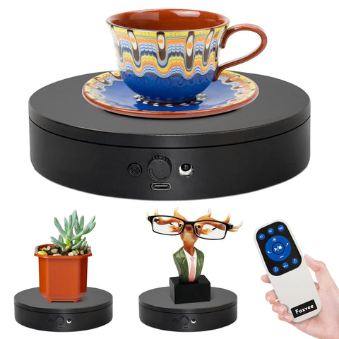 Foxvee Remote Control Electric Turntable Display Stand 360 Degree Silent Spinning Platform For Showcases with cup and figurines.