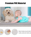 Baby in green outfit and dog lying on Premium PVC Material mat, easy to clean with a cloth for a fresh surface.