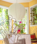 Jumbo White Paper Lantern 30 Inch Indoor Decor For Large Rooms Elegant Reusable Accordion Style Lighting Ideal For Parties And Events Ceiling Decor Showstopper Vibe Party Ready hanging in a bright room.