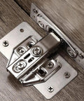 Stainless Steel Cabinet Hinge Repair Plate Fixing Bracket With Screws, Rust Resistant Silver Finish, installed on wood surface