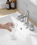 8 Inch Widespread Bathroom Faucet With 3 Hole Mount Two Handle Brass Waterfall Sink Faucet Polished Chrome pouring water into glass