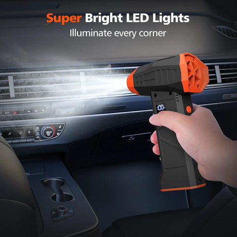 Hand holding Cordless 110000RPM Air Duster With Four Speed Levels Portable Jet Dry Blower for cleaning car dashboard
