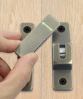 Hand installing Heavy Duty 90 And 180 Degree Flip Latch Lock for sliding barn doors, gates, sheds, antique bronze finish.