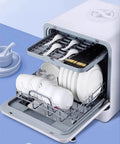 Slick Portable Countertop Dishwasher Fully Automatic Mini Appliance displays white plates, cups, and utensils organized for washing.