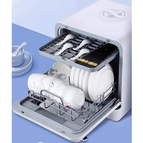 Slick Portable Countertop Dishwasher Fully Automatic Mini Appliance displays white plates, cups, and utensils organized for washing.
