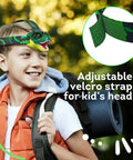 Boy wearing Dinosaur Roaring Headlamp for Kids with LED Light, featuring adjustable velcro strap and realistic design.
