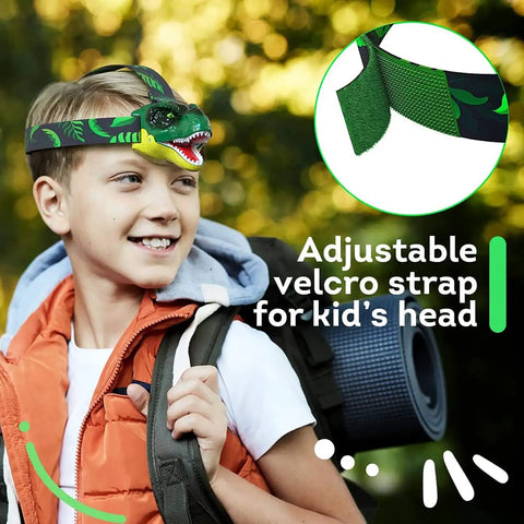 Boy wearing Dinosaur Roaring Headlamp for Kids with LED Light, featuring adjustable velcro strap and realistic design.