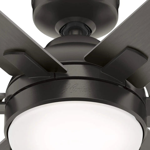 Close-up of Indoor Ceiling Fan With LED Light In Rustic Bronze Finish, 44 Inch Blade Span, showing light fixture and motor housing.
