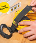 Person using Heavy-Duty 28 Inch Storage Straps Set 2-Pack No-Fuss Hook And Loop Cord Carrier Hanger on yellow cable