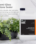 Hella Tough Semi Gloss Stone Sealer For Natural Stone Pavers Tile And Concrete With A Smooth Wet Look Finish That Keeps Oil And Water Spills At Bay Indoors Or Out Using A Water Based Formula For Serious Daily Protection In A One Gallon Size, displayed beside green plants.