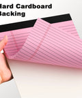 Person holding Pink Legal Pad 8.5 X 11 Wide Ruled Writing Pad Set With Perforated Backing 30 Sheets Per Pad, showing hard cardboard backing.
