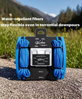 Two Pack Outdoor Rope Adjusters For Camping with water-repellent fibers displayed on grass with mountain backdrop