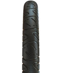 Close-up of Hookworm 24x2.50 BMX Cruiser Trail Tire tread pattern, built tough as nails for urban streets and park sessions, ultra durable