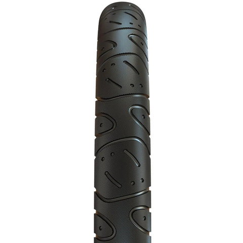 Close-up of Hookworm 24x2.50 BMX Cruiser Trail Tire tread pattern, built tough as nails for urban streets and park sessions, ultra durable