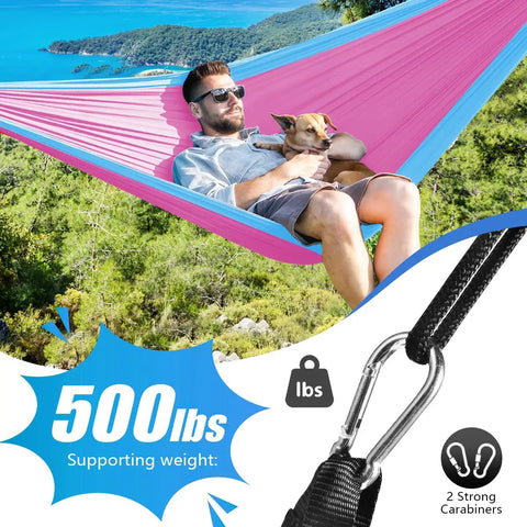Camping Hammock For All Adventures Heavy Duty Nylon 500 Pound Capacity Portable Lightweight Single Or Double With Tree Straps And Carry Bag Ideal For Camping Backpacking Hiking Travel Beach Outdoor Indoor Blue And Pink with person and dog