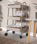 Smooth Rolling Tpe Caster Cups For Office Chairs Straight Up Floor Protectors That Block Hardwood And Carpet From Deep Scrapes Quiet Slide Wheel Stops Five Pack Durable Rubber Foot Caps on a contemporary shoe rack with shoes.