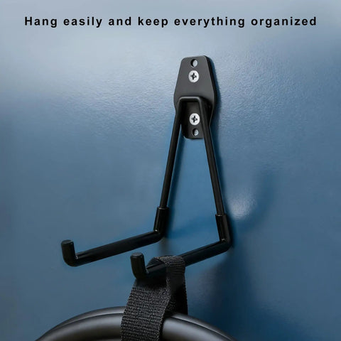 Heavy Duty U Shaped Garage Hooks With Slick Non Slip Coating For EV Charging Cable Holder mounted on wall holding cables.