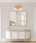 Soft Gold 4 Light Vanity Fixture With Seeded Glass Shade 31 Inch in elegant home interior above white console