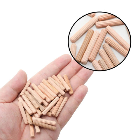 48 Pieces Wood Dowel Pins 5mm By 30mm Fluted Beveled Ends Dowels shown on a hand for size reference, ideal for woodworking.