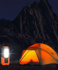 Portable LED Work Light With Magnetic Base And Hanging Hook, Battery Powered COB Grab And Go Pocket Light illuminating orange tent
