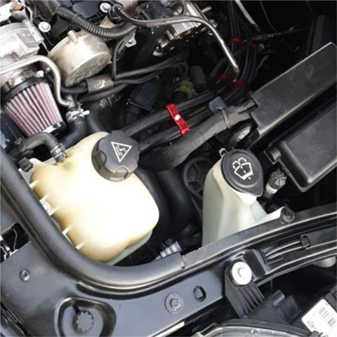 Get Your Custom Hose Clamps Ready With This 10 Piece Aluminum AN4 AN6 AN8 AN10 AN12 Separator Kit For Braided Rubber Line Divider Clamps That Lock Down Tight And Keep Every Connection Secure For Any High Performance Ride Or Rig You Are Building Right Now. installed on braided lines in an engine bay