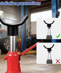 Bottle jack adapter with black U-shaped lifting saddle atop a chrome piston on a red hydraulic bottle jack.