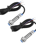Two inductive proximity sensor switches M12 shield type LJ12A3-2-Z/BY, 2mm detection range, 10-30V DC, shown with blue shielded metal housing and cables.