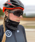 Cyclist wearing Dope Photochromic Cycling Glasses For Men And Women Mountain Bike Sunglasses With Lens That Darkens From Clear To Gray