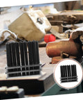 Beefy Pro Grade Transfer Punch Set for Machinists, Heavy Duty Punch Base Kit on a workshop table with tools