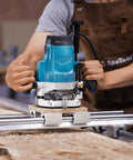 Carpenter uses 1/4 Inch Shank Spoilboard Surfacing Router Bit With 1-1/4 Inch Cutting Diameter And 2 Plus 2 Inserts for wood leveling