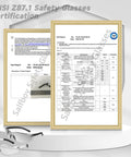 ANSI Z87.1 Safety Glasses Certification document with heavy duty clear safety glasses on display, showcasing polycarbonate material.