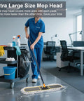 Straight Up 24 Inch Commercial Dust Mop Heavy Duty Floor Duster With Smooth Swivel Head Grey in office setting with cleaning cart.