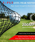 Close-up of 5-ply netting from 10x7ft Golf Net With Target Cloth And Dual Turf Mats showing a ball caught mid-flight against greenery.