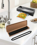 Six-pack black gasket seals for Geryon E2900/E2901/E5700 vacuum sealer; open cardboard box with gasket strips on kitchen counter