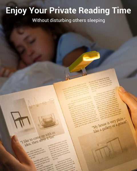 Child reading with Go-To Clip On Book Light For Reading At Night With Amber And Warm White Glow Four Lighting Modes Eye Protection USB Powered Flexible Clip Lamp For Kids And Adults Adjustable Brightness Green