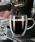 Grab These Sleek Double Wall Glass Coffee Mugs Set Of Two, Tough Borosilicate Build Keeps Your Daily Grind Straight Fire Or Icy Fresh, Ergonomic Handle Design Perfect For Kitchen Vibes And Road Trips. Close-up of espresso pouring into heatproof glass mug.