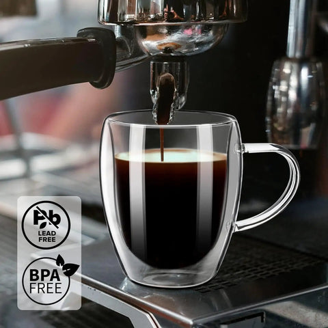 Grab These Sleek Double Wall Glass Coffee Mugs Set Of Two, Tough Borosilicate Build Keeps Your Daily Grind Straight Fire Or Icy Fresh, Ergonomic Handle Design Perfect For Kitchen Vibes And Road Trips. Close-up of espresso pouring into heatproof glass mug.