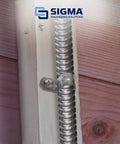 Installed One Hole AC/MC Cable Strap 3/8 Inch Gray 100 Count for 14/2 and 12/2 cables on wooden surface.