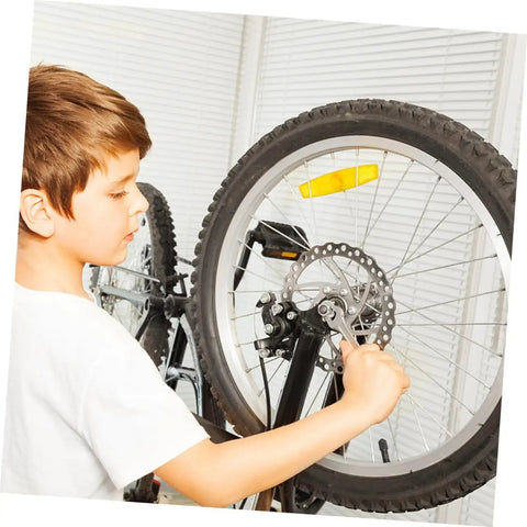 Child adjusting Rock Solid Mountain Bike Disc Brake Kit With Mechanical Calipers and Complete Pair Of 160mm Rotors.